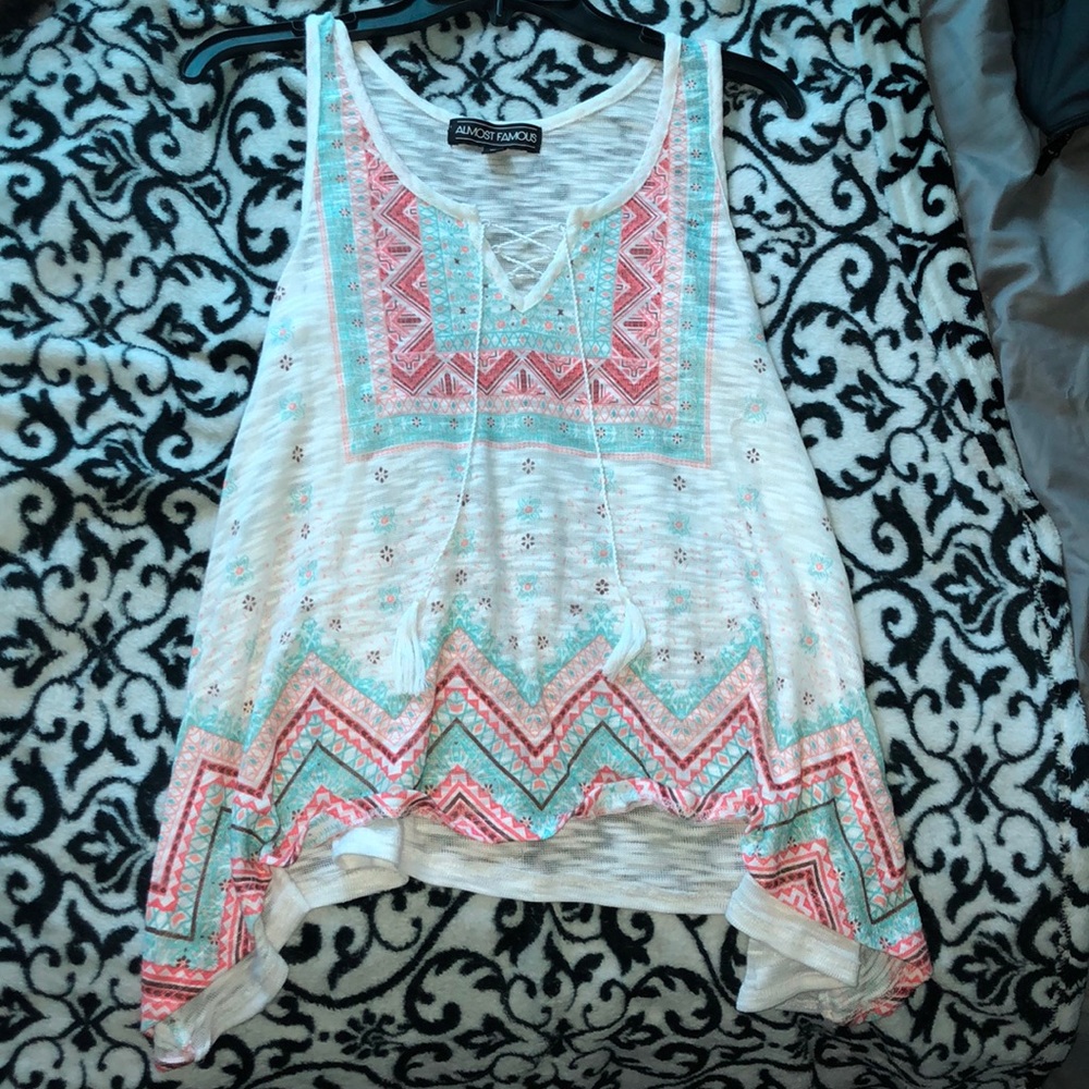 Pretty patterned tank top, a little see through.